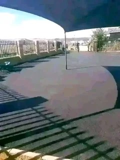 Tar surfacing and brick paving