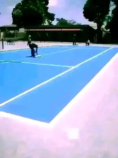 Tar surfacing and brick paving