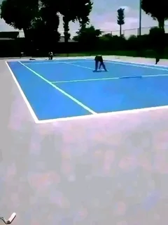 Tar surfacing and brick paving