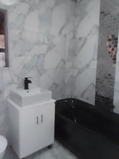 Tiling, building, ceilings, plumbing, paving and painting renovations in all  sides of Pretoria.