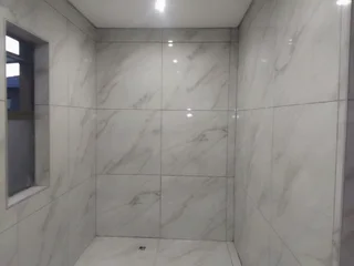 Tiling, building, ceilings, plumbing, paving and painting renovations in all  sides of Pretoria.