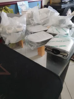 Mechanisms for frameless sliding doors