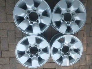 15inch Toyota Hillux Magrims 6holes Wth No Centre Caps A Set Of Four On Sale.