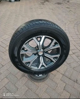 One Fairy Used Dunlop Grand Trek Tyre 265 60r18 & 18inch Isuzu Dmax Magrim On Sale.