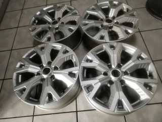 18Inch 6Holes ISUZU DMAX Magrims SILVER A set of four on sale.