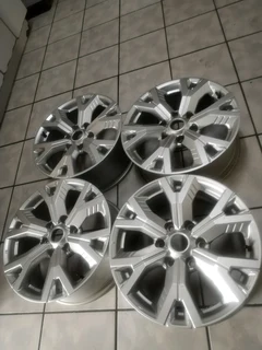 18Inch 6Holes ISUZU DMAX Magrims SILVER A set of four on sale.