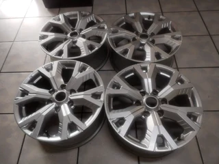18Inch 6Holes ISUZU DMAX Magrims SILVER A set of four on sale.