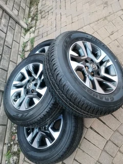 18inch Toyota Hillux /fortuna Magrims & Dunlop Grand Trek Tyres 265 60r18 A Set Of Four On Sale.