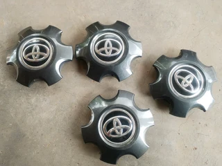 Isuzu Wheel Centre Caps A Set Of Four On Sale.