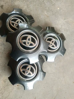 ISUZU Wheel Centre Caps A set of four on sale.