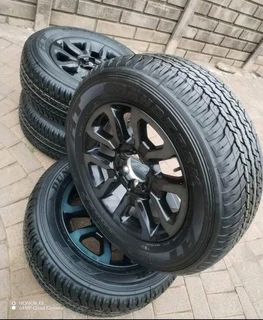 265 60R18 DUNLOP GRAND TREK Tyres &amp; 18Inch TOYOTA HILLUX Magrims 6Holes a set of four on sale.