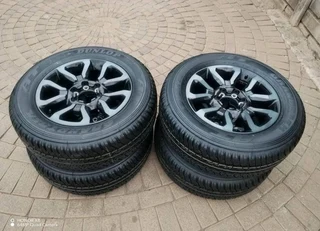 265 60R18 DUNLOP GRAND TREK Tyres &amp; 18Inch TOYOTA HILLUX Magrims 6Holes a set of four on sale.