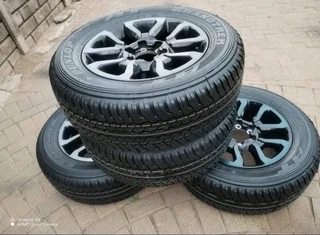 265 60R18 DUNLOP GRAND TREK Tyres &amp; 18Inch TOYOTA HILLUX Magrims 6Holes a set of four on sale.