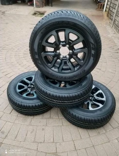 265 60R18 DUNLOP GRAND TREK Tyres &amp; 18Inch TOYOTA HILLUX Magrims 6Holes a set of four on sale.