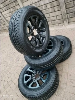18Inch TOYOTA HILLUX Magrims 6Holes &amp; DUNLOP GRAND TREK Tyres 265 60R18 A set of four on sale.