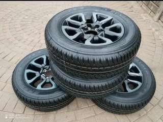 18Inch TOYOTA HILLUX Magrims 6Holes &amp; DUNLOP GRAND TREK Tyres 265 60R18 A set of four on sale.