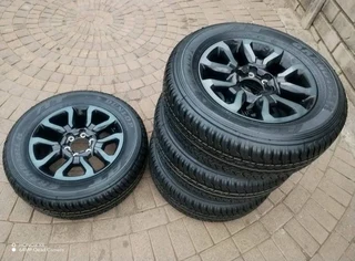 18Inch TOYOTA HILLUX Magrims 6Holes &amp; DUNLOP GRAND TREK Tyres 265 60R18 A set of four on sale.