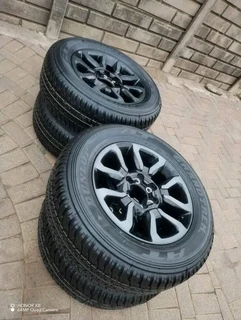 18Inch TOYOTA HILLUX Magrims 6Holes &amp; DUNLOP GRAND TREK Tyres 265 60R18 A set of four on sale.