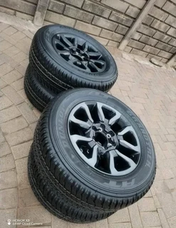 18Inch TOYOTA HILLUX Magrims 6Holes &amp; DUNLOP GRAND TREK Tyres 265 60R18 A set of four on sale.
