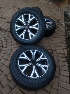 18Inch ISUZU DMAX Magrims 6Holes &amp; GENERAL GRABBER AT 3 Tyres 265 60R18 A set of four on sale.