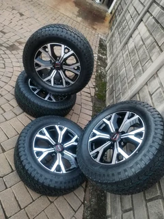 18inch Isuzu Dmax Magrims 6holes & General Grabber At 3 Tyres 265 60r18 A Set Of Four On Sale.