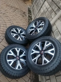 18Inch ISUZU DMAX Magrims 6Holes &amp; GENERAL GRABBER AT 3 Tyres 265 60R18 A set of four on sale.