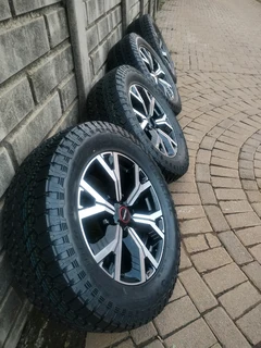 18Inch ISUZU DMAX Magrims 6Holes &amp; GENERAL GRABBER AT 3 Tyres 265 60R18 A set of four on sale.