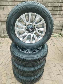 18inch Toyota Hillux /fortuna Magrims 6holes Silver & Dunlop Grand Trek Tyres 265 60r18 A Set.