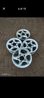 16Inch MAHINDRA Magrims 5Holes Silver a set of four on sale.