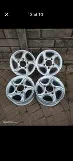 16Inch MAHINDRA Magrims 5Holes Silver a set of four on sale.
