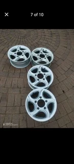 16Inch MAHINDRA Magrims 5Holes Silver a set of four on sale.