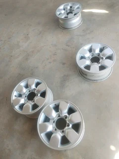 15 inch t o y o t a h i l l u x magrims 6 holes w t h n o c e n t r e c a p s a set of four on sale