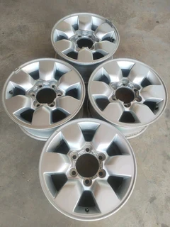 15 inch t o y o t a h i l l u x magrims 6 holes w t h n o c e n t r e c a p s a set of four on sale