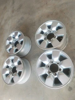 15 inch t o y o t a h i l l u x magrims 6 holes w t h n o c e n t r e c a p s a set of four on sale