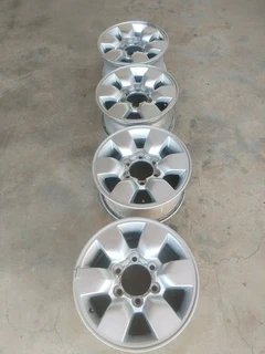 15 inch t o y o t a h i l l u x magrims 6 holes w t h n o c e n t r e c a p s a set of four on sale