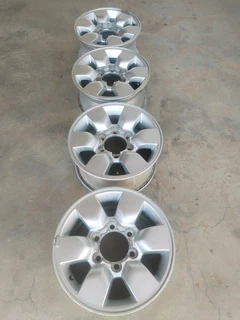 15 inch t o y o t a h i l l u x magrims 6 holes w t h n o c e n t r e c a p s a set of four on sale