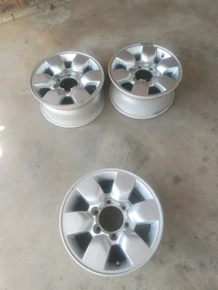 15 inch t o y o t a h i l l u x magrims 6 holes w t h n o c e n t r e c a p s a set of four on sale