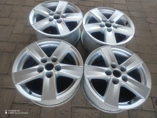 15 Inch M I T S U B I S H I Magrims 5 Holes  Wth No Centre Caps A Set Of Four On Sale