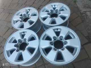 16 inch t o y o t a magrims 6 holes w t h n o c e n t r e c a p s a set of four on sale