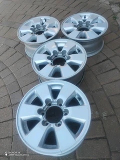 16 inch t o y o t a magrims 6 holes w t h n o c e n t r e c a p s a set of four on sale