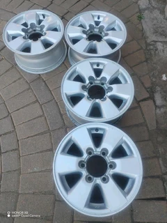 16 inch t o y o t a magrims 6 holes w t h n o c e n t r e c a p s a set of four on sale