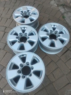 16 inch t o y o t a magrims 6 holes w t h n o c e n t r e c a p s a set of four on sale
