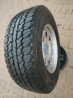 O n e n i s s a n h a r d b o d y Standard Steel Rim 16 inch & fairy used g o o d y e a r tyre