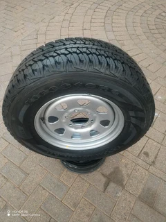 O n e n i s s a n h a r d b o d y Standard Steel Rim 16 inch &amp; fairy used g o o d y e a r tyre
