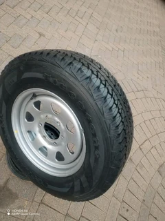 O n e n i s s a n h a r d b o d y Standard Steel Rim 16 inch &amp; fairy used g o o d y e a r tyre