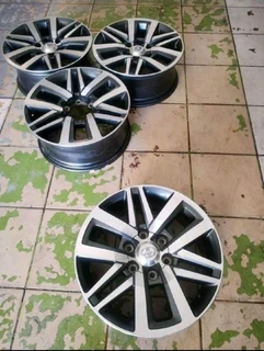 18 inch 6 holes t o y o t a h i l l u x f o r t u n a magrims a set of four on sale