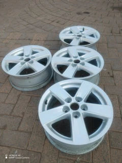 16 inch m i t s u b i s h i magrims 5 holes  Wth NO CENTRE CAPS a set of four on sale