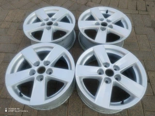 16 inch m i t s u b i s h i magrims 5 holes  Wth NO CENTRE CAPS a set of four on sale