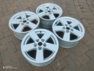 16 inch m i t s u b i s h i magrims 5 holes  Wth NO CENTRE CAPS a set of four on sale