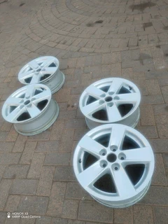 16 inch m i t s u b i s h i magrims 5 holes  Wth NO CENTRE CAPS a set of four on sale